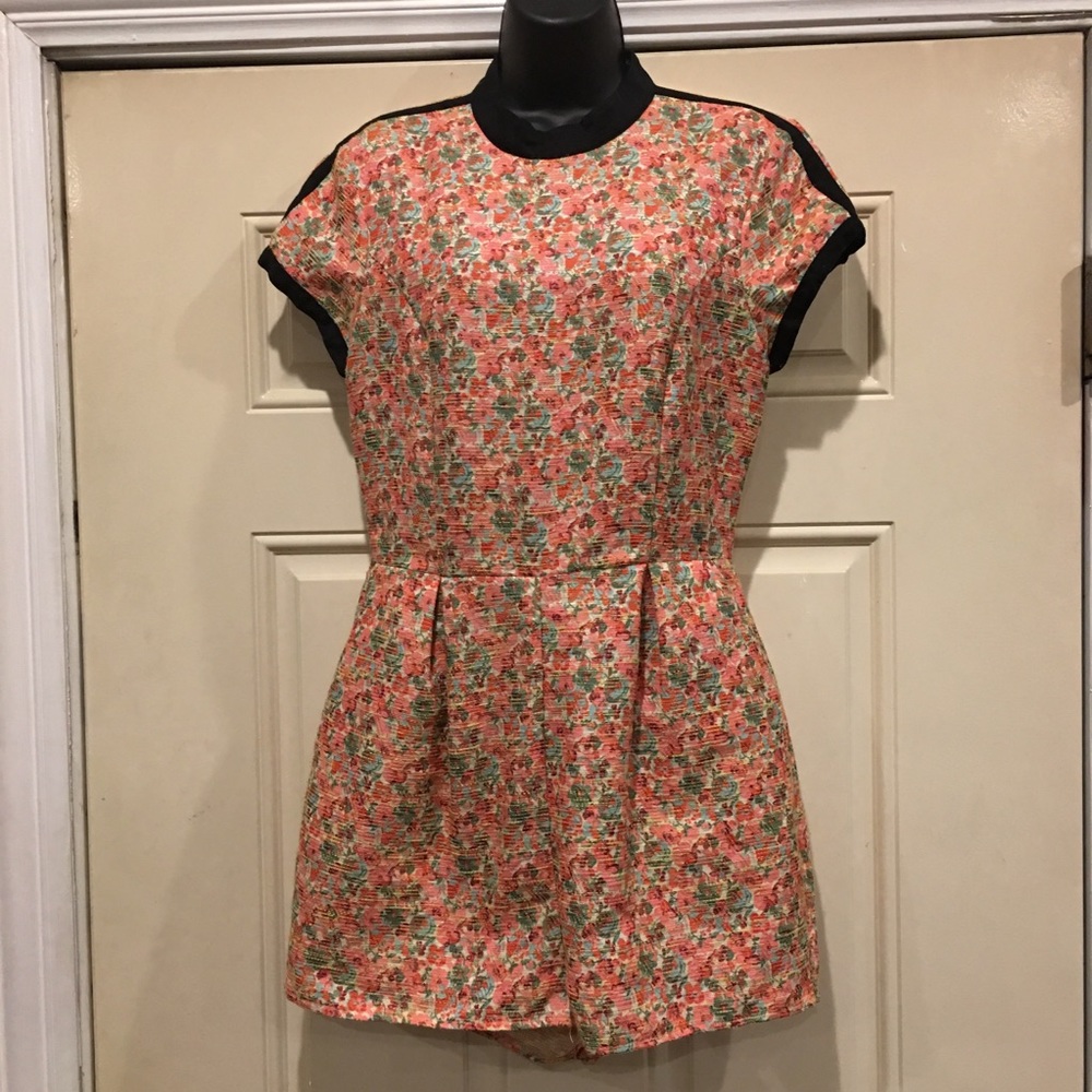 Topshop multicolored floral one piece shorts.